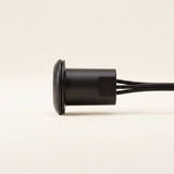 Perfil del sensor táctil negro para cinta LED sobre fondo blanco