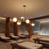 Zona de descanso en un spa premium con iluminacion relajante de la lampara Nova Gold.