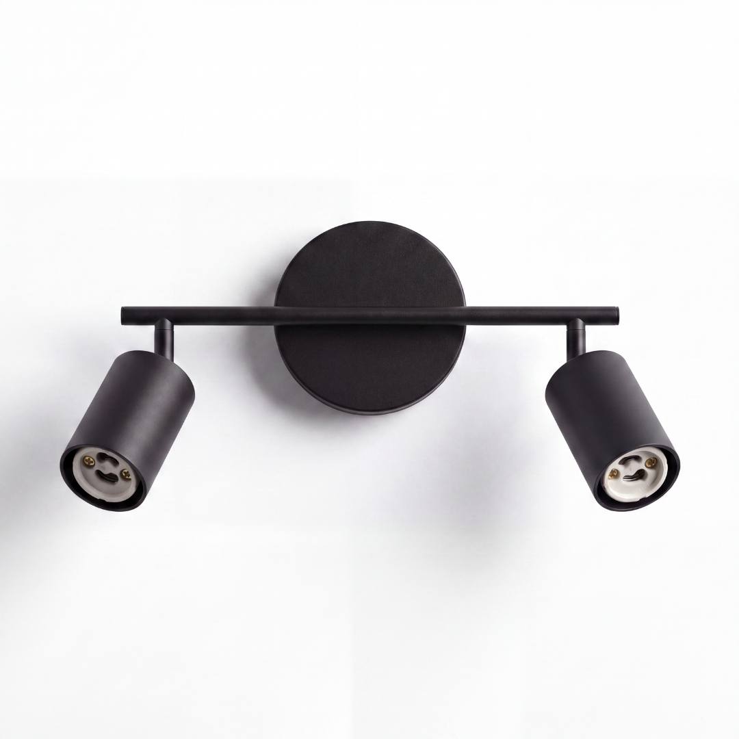 Spot adosable doble negro con cabezales orientados sobre fondo claro