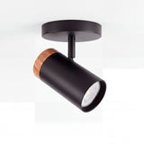 Spot adosable Noa negro con remate de madera sobre fondo blanco