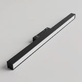 Spot LED lineal magnético encendido con luz cálida continua y uniforme