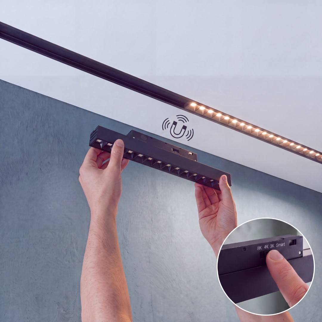 Mano instalando spot LED magnético grille de 22 cm en riel magnético 48V