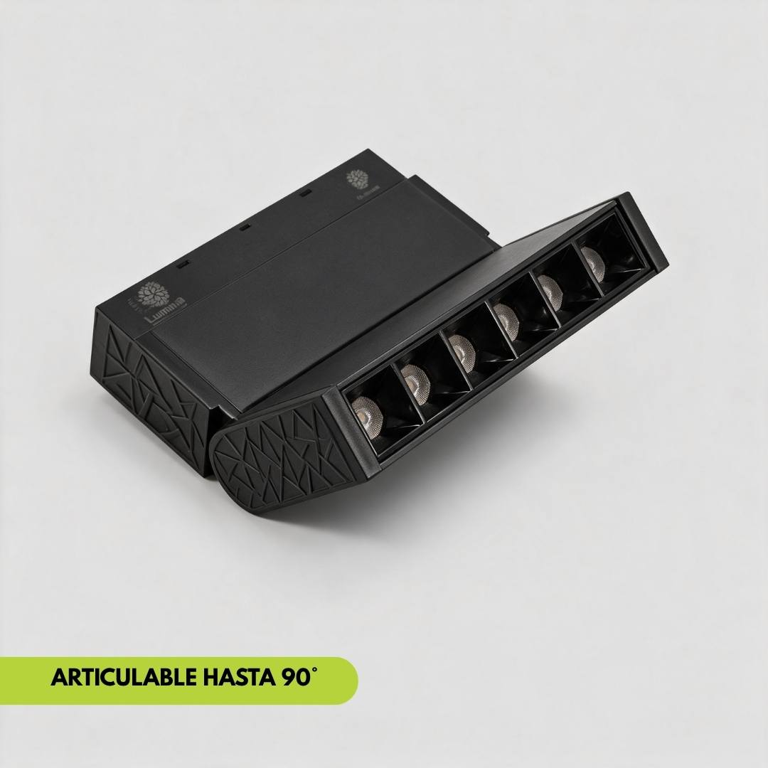 Spot magnético articulado a 90 grados iluminando cuadro en la pared