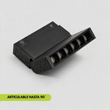 Spot magnético articulado a 90 grados iluminando cuadro en la pared