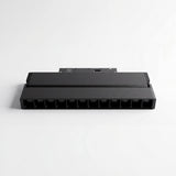 Spot LED articulable instalado en riel adosable de superficie