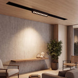 Spots LED magnéticos en riel de techo de sala de estilo minimalista