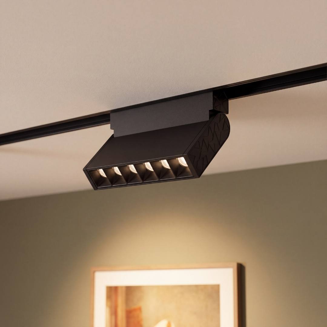 Spot LED magnético articulado en riel 48V dirigiendo la luz