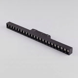 Vista tres cuartos del spot magnético grille negro de aluminio de 44 cm