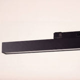 Spot magnético lineal negro con base adaptadora para riel magnético 48V