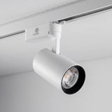 Spot LED en riel con cabezal inclinado 90 grados en posición horizontal