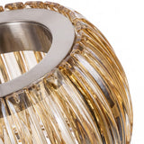 Detalle de acabado en vidrio estriado color miel y soporte metálico cromado de alta calidad.