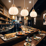 Zoom a la textura de flor de la pantalla de vidrio blanco de la luminaria Loto.