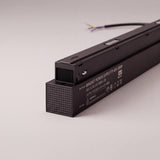 Transformador magnético smart Tuya de 100W sobre superficie clara, riel no incluido