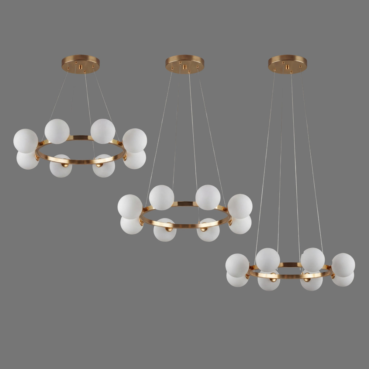 Composicion que muestra la versatilidad de altura de la lampara Collier Gold en diferentes niveles de suspension.