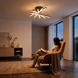 Flujo luminoso de sobreponer sobre rincón de descanso que promueve la ergonomía visual.