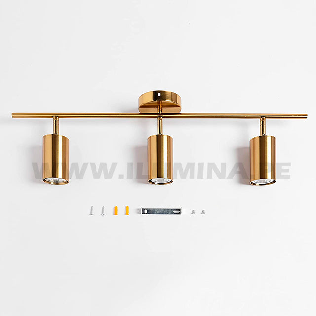 Lámpara para poner encima del espejo del baño. Lámpara de tres luces direccionables para iluminar cuadros en color dorado con sockets gu10. Venta de luminaria orientable de tres luces para dicroico LED en gu10. Lámpara de techo dirigible con cabezal orientable para luces LED. Venta de lámparas de techo en Lima en Perú.
